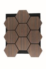 Wooden hexagonal tiles with visible grain arranged in a honeycomb pattern on a black backing area.