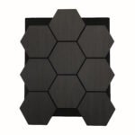 Seven dark hexagonal tiles arranged in a honeycomb pattern on a square backing.